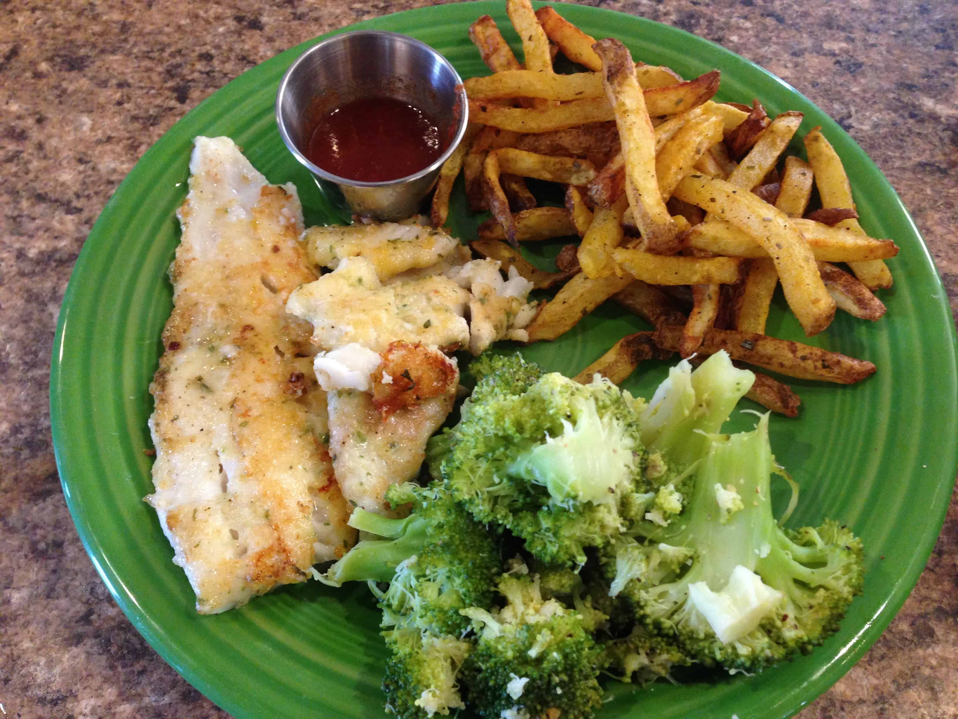 Fresh fish, steamed broccoli, and air fryer french fries