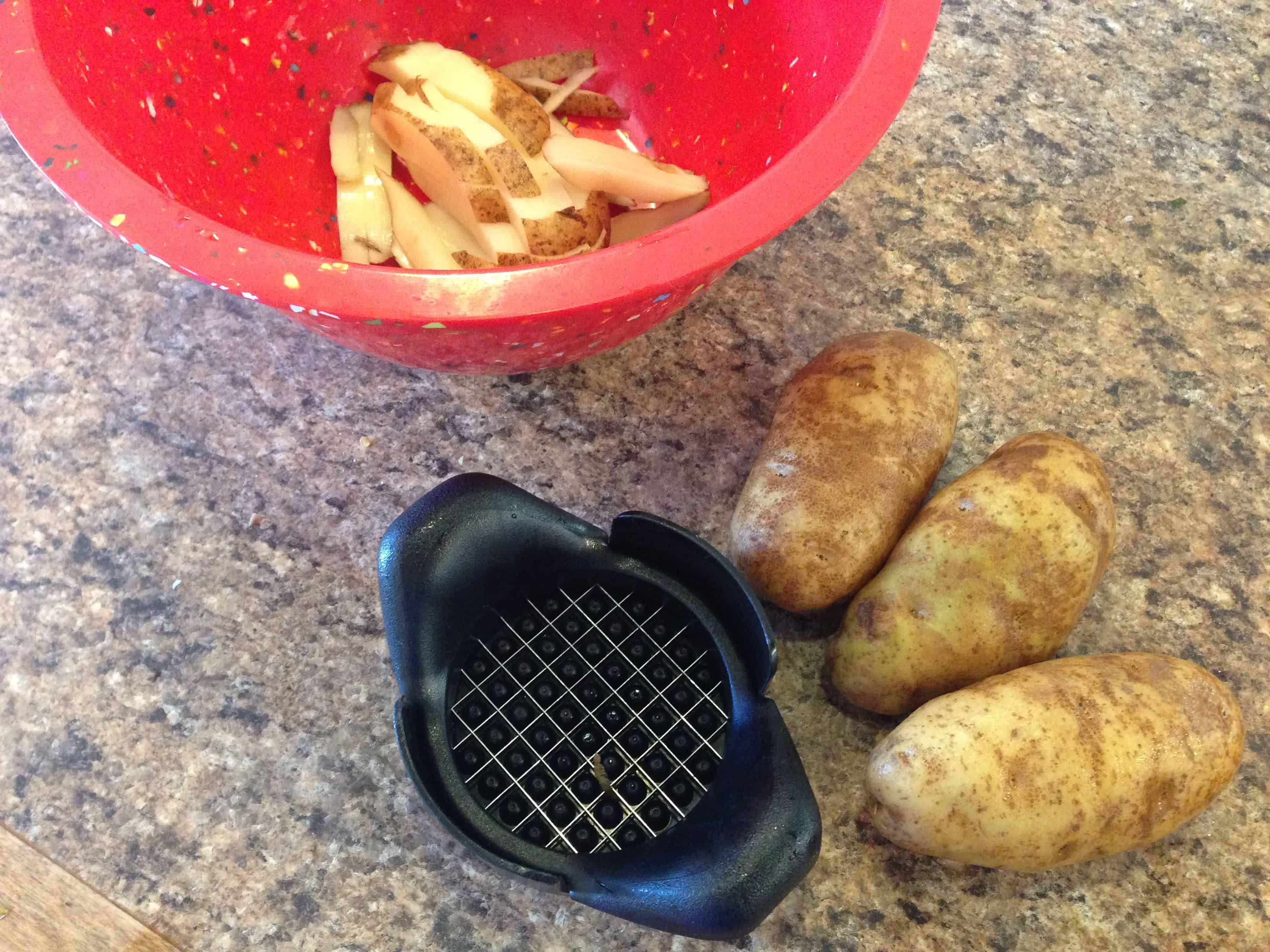 Getting ready to cut potatoes for french fries