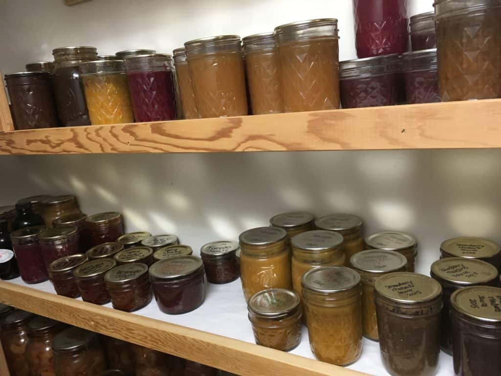 My homemade jam and preserves pantry under my stairs