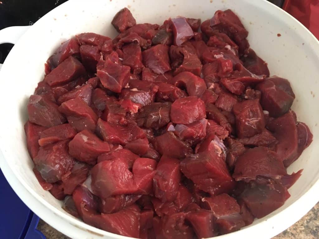 Cubed venison to be pressure canned