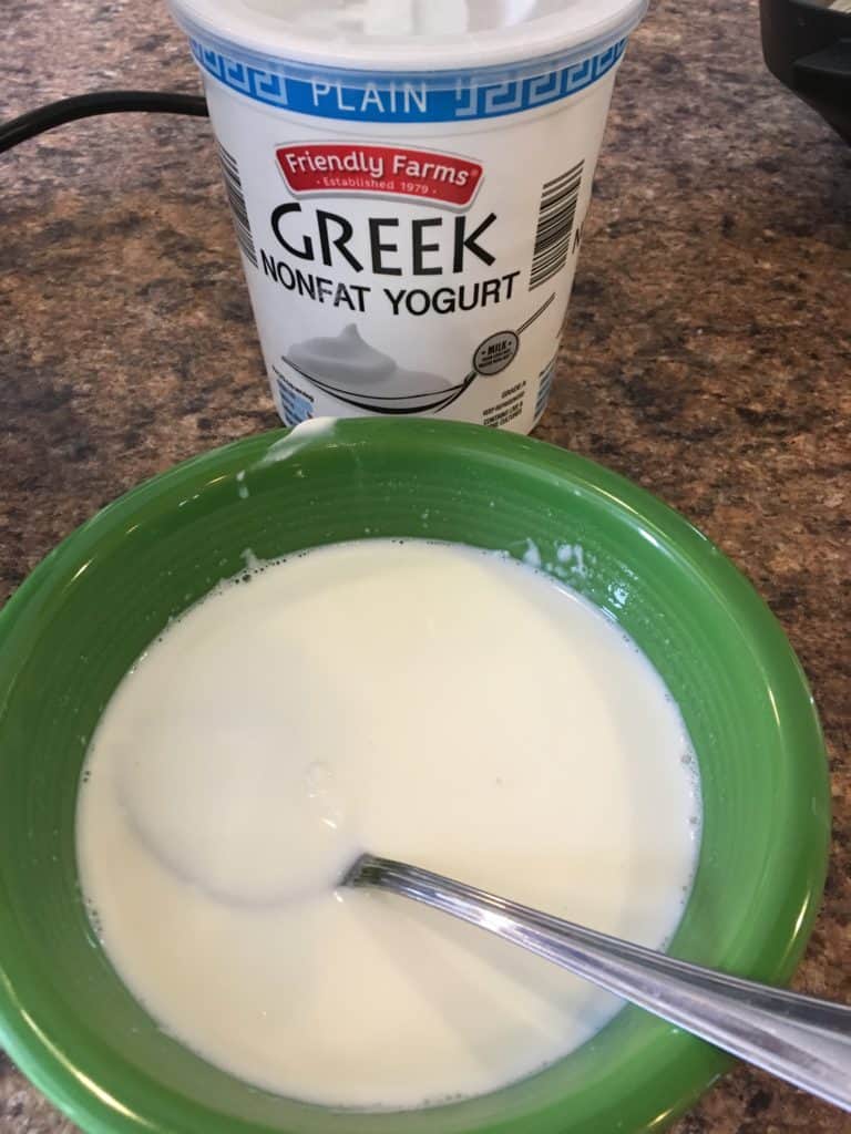 Stirring starter culture to go into Instant Pot with milk for yogurt
