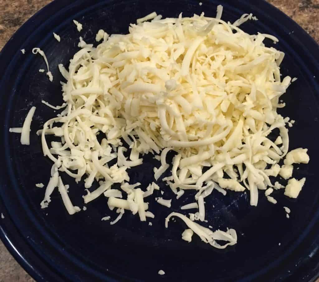 The shredded cheese for the Loaded Potato Nachos