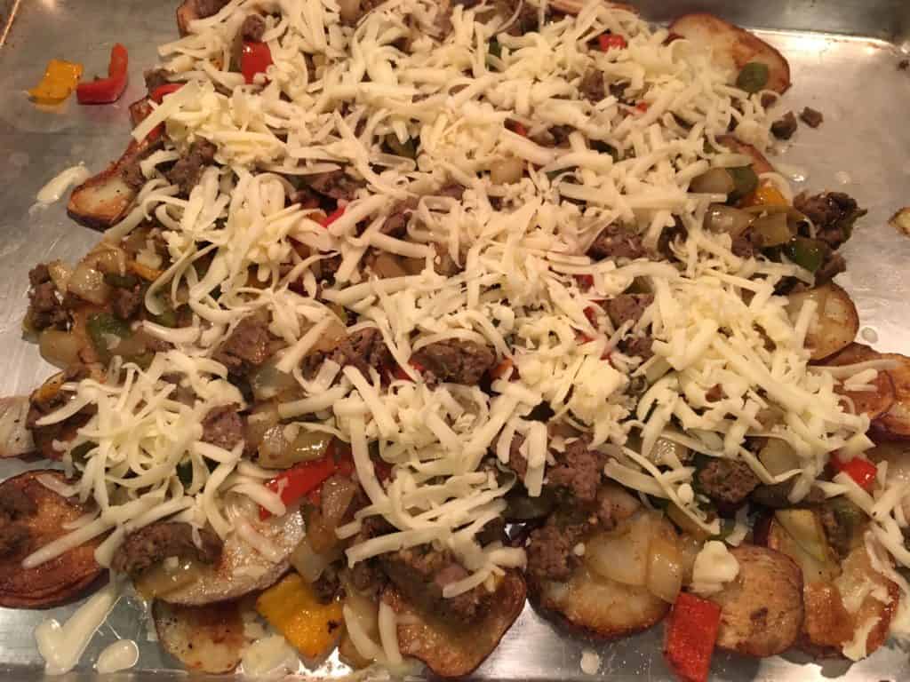 Loaded Potato Nachos before the melted cheese