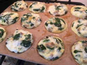Spinach, mushroom and egg cups coming out of oven