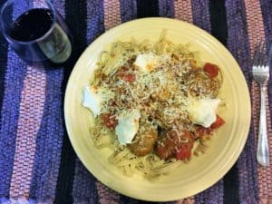 Eggplant turkey meatballs with mushroom tagliatelle pasta and merlot wine.