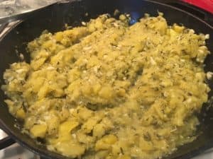 Zucchini butter cooking down