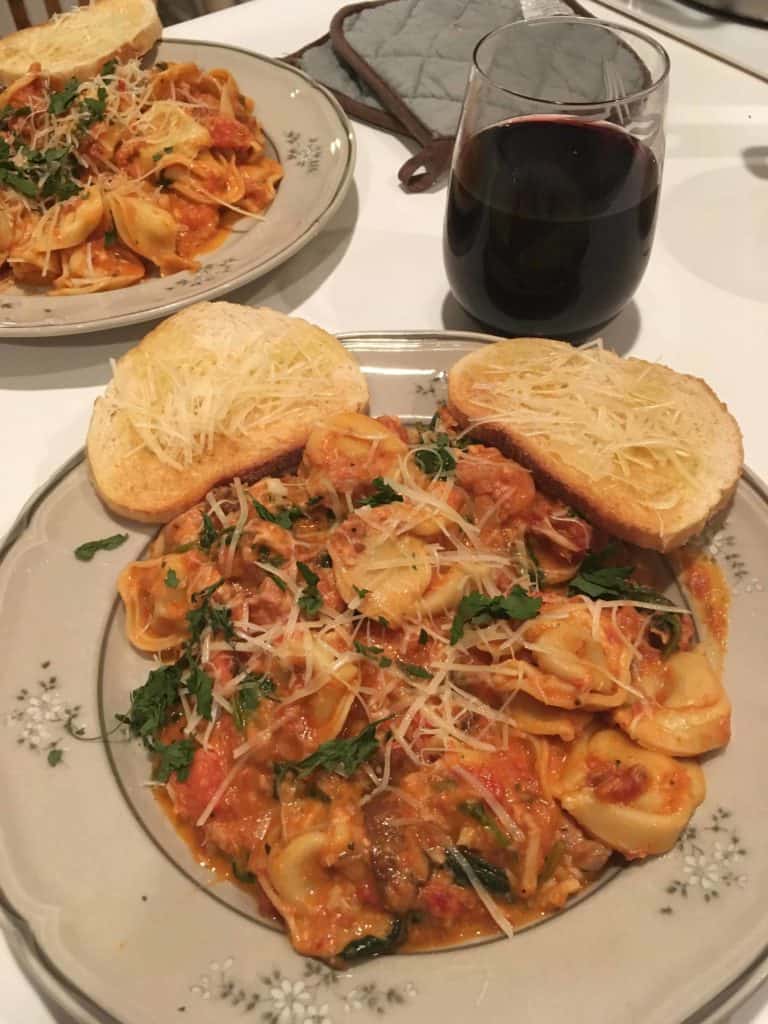 Cheese Tortelli with Sausage and Spinach