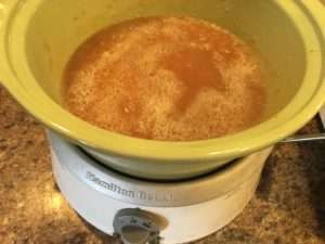 Apple butter cooking down in the slow cooker