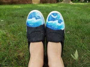 Toes stepping into the ocean canvas painted shoes