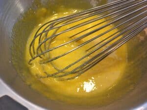 The start of lemon curd with a metal whisk