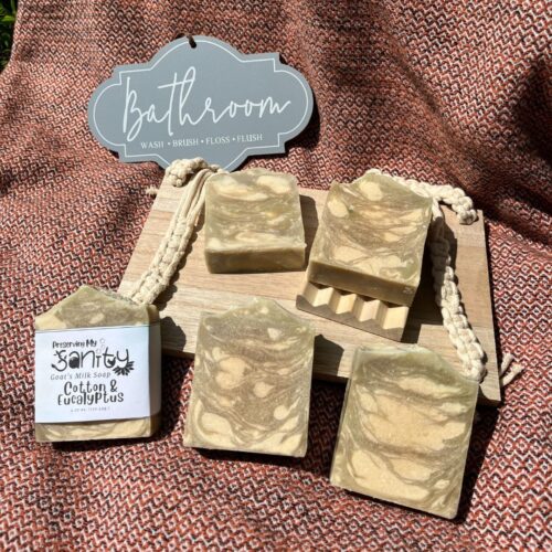 Exterior collage photo of several bars of cotton eucalyptus soap on a Turkish bath towel in the sunshine