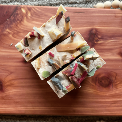 Top view of three bars of holiday confetti soap