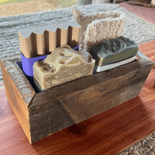 Alternate view of small reclaimed wood trough great for making your own gift bundle for the holidays, pictured with two bars of handcrafted goat's milk soap, a wood soap dish, and a sisal soap bag (not included)