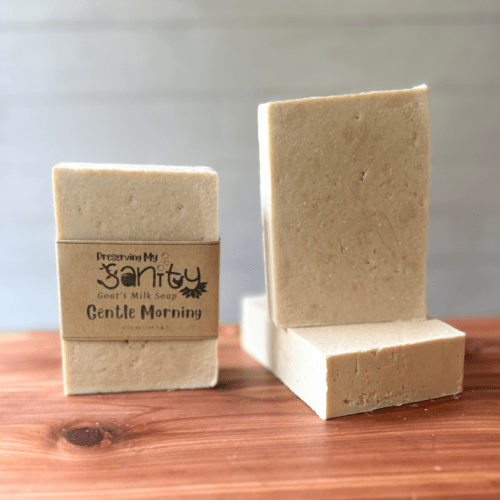 Photo of three bars of gentle morning goat milk soap displayed to show design, top, and label