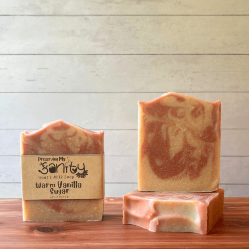 This display photo showcases three bars of Warm Vanilla Sugar goat milk soap, one with a label and the other two arranged to show alternate views of these artisan bars of soap. All of my soaps and other products are handcrafted in small batches in Minnesota.