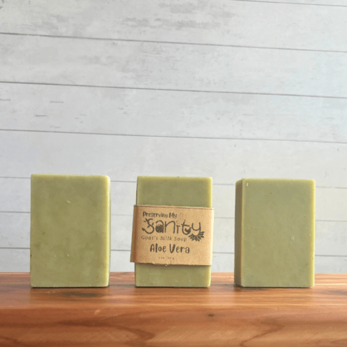 Front view photo of three bars of Aloe Vera goat milk soap with essential oils