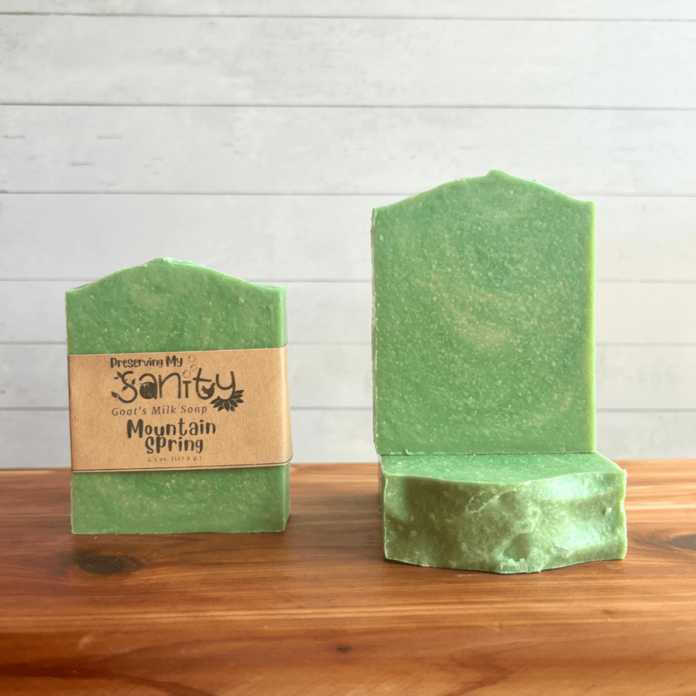 Front view photo showcasing three bars of Mountain Spring goat milk soap