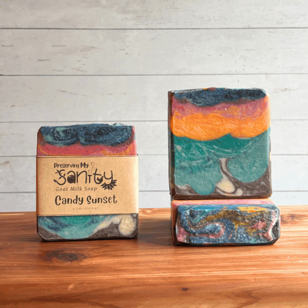 Alternate view display photo showing three bars of Candy Sunset goat milk soap. Pictured to show the 16 colors of this creation that was inspired by one of my favorite painitngs, this was my entry for the April Soap Challenge Club. Scented with a fresh beachy scent, grab one now while this limited edition soap lasts!